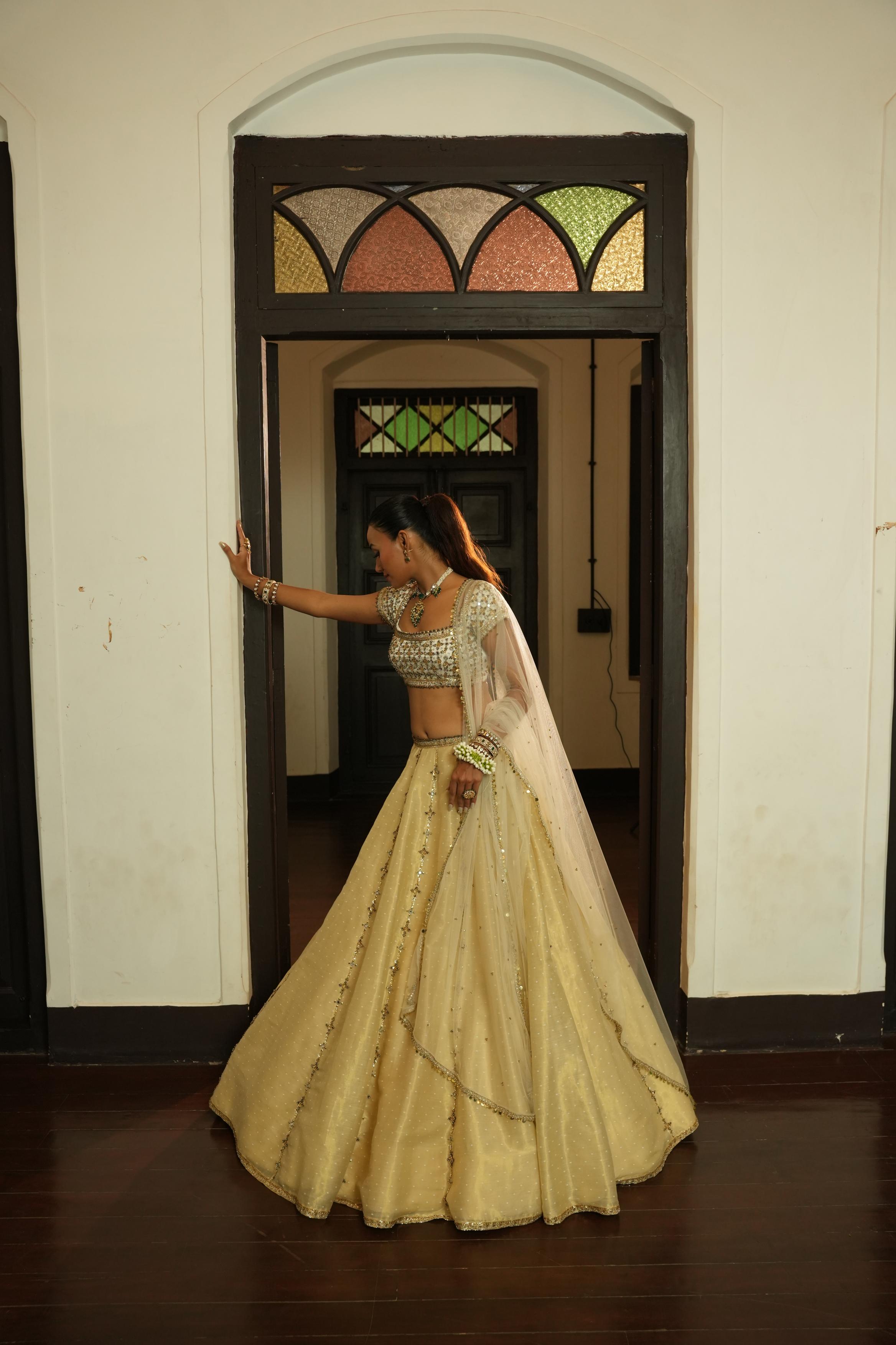 Ivory (Self Gold Zari Buttie) Lehenga