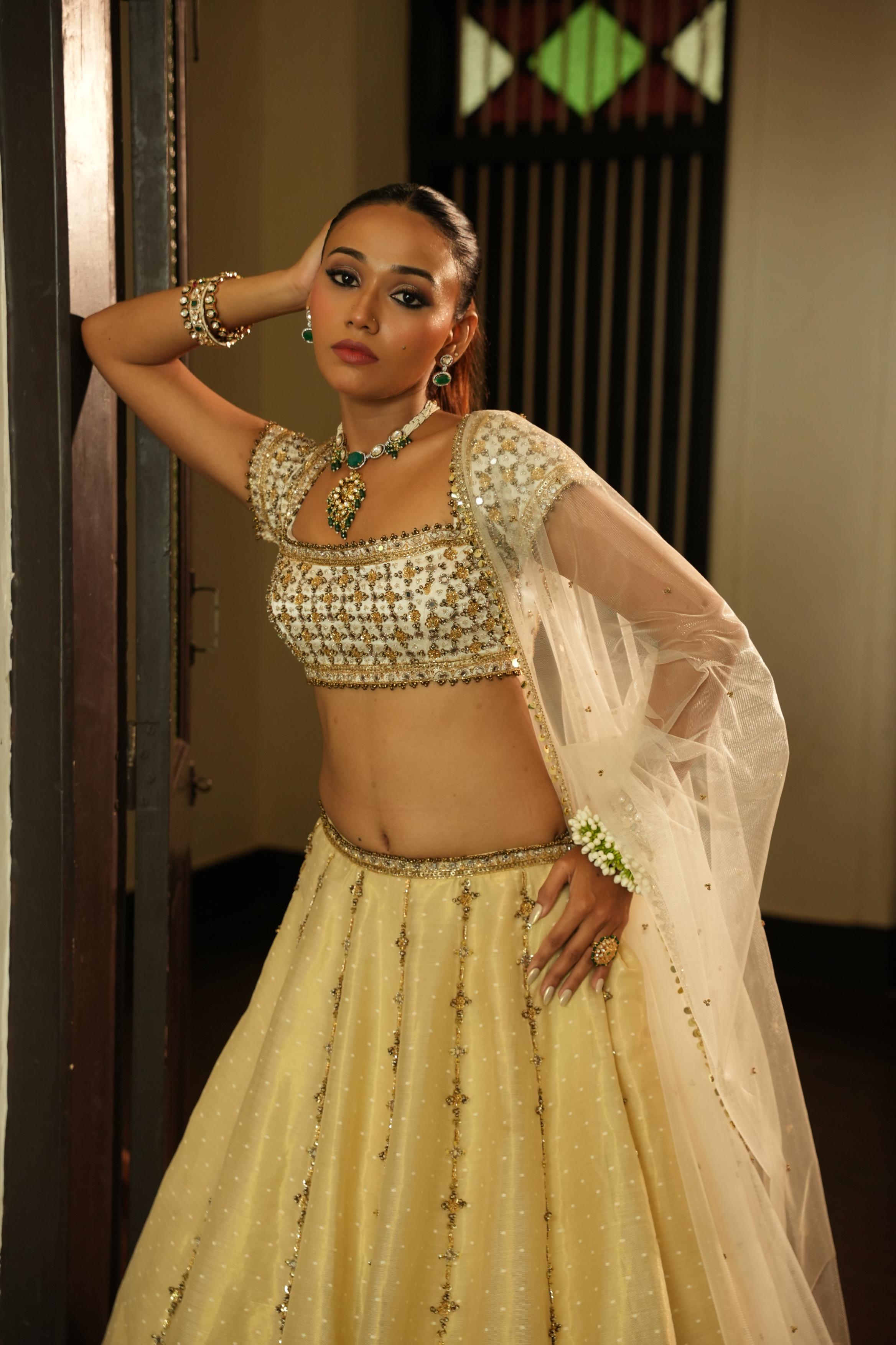 Ivory (Self Gold Zari Buttie) Lehenga